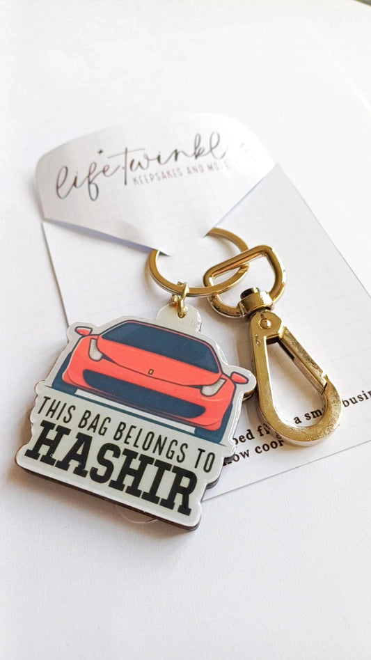 That red car backpack tag